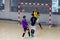ODESSA, UKRAINE - CIRKA, 202020: Unidentified local team players play futsal futsal tournament on the parquet floor. The right mom