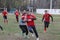 Odessa, Ukraine November 24, 2019: local Rugby clubs engaged in fierce fight on green unequipped field in Rugby Derby tournament.