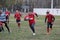 Odessa, Ukraine November 24, 2019: local Rugby clubs engaged in fierce fight on green unequipped field in Rugby Derby tournament.