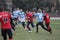 Odessa, Ukraine November 24, 2019: local Rugby clubs engaged in fierce fight on green unequipped field in Rugby Derby tournament.