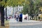 Odessa, Ukraine. October, 2018. Family Day. Parents` active leisure on foot with children in wheelchairs, roller skates, bicycles