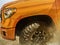 Odessa, Ukraine- September 2, 2018: Moving offroad orange Toyota