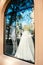 ODESSA, UKRAINE â€“ 22 September, 2018: Female mannequin in wedding dress in showcase. Bridal dresses Salon Showcase window