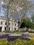 ODESSA, UKRAINE â€“ April 29, 2019: View of the flowerbed. Colorful circular flower bed with yellow, blue and white pansies in