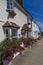 Odiham, Village Cottage with colourful flower pots