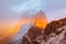 Odle mountain range, Seceda peak between clouds in beautiful sunset scene, Val Gardena in Dolomites