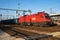 OEBB Austrian Railways cargo freight train with Siemens Taurus 1116 129-8 Locomotive at Budapest Kelenfold railway train