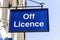 Off Licence or liquor store blue advertising logo sign