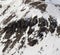 Off-piste slope with stones in little snow year