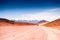 Off-road cars driving on the road in the desert on plateau Altiplano, Bolivia