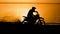 Off-road motorbike extreme cornering. Motorcyclist at sunset near the river. Extreme motocross bike, dirt from under the
