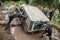 Off-road Trophy UAZ 469 stucks in mud pit.