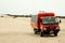 An off-road truck came to pick-up tourists at the Sand Dunes