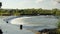 Off-road truck driving the Ivanhoe Crossing, Kununurra, Western Australia, Australia. A concrete causeway over Ord River