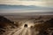 off-road vehicle disappearing into the distance, with a view of expansive desert landscape