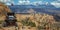 Off road vehicle and La Sal Mountain pano in Moab