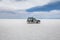 Off-road vehicle in Salar de Uyuni salt flat - Potosi Department, Bolivia