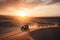 off-road vehicle speeding over dunes in the desert, with a dramatic sunset in the background