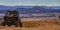 Off road vehicle and striking cliffs in Moab Utah