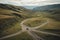 off-road vehicle traversing winding path through scenic landscape