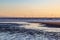 An off shore wind farm at sunset, off the Formby coast