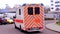 Offenbach, Germany - January 2022: modern Red paramedic ambulance emergency service vehicle, medics provide assistance, concept of