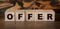 OFFER word concept written on wooden cubes. Business concept