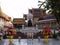 Offerings in front of the Monument of King Chulalongkorn Rama V. Wat Ratchabophit temple. Bangkok, Thailand
