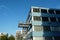 Office building with external metal staircase in the middle of a residential area