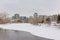 Office buildings behind a snow covered park along Ottawa river