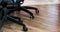 Office chairs casters wheels on a wooden floor