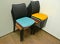 Office chairs are put with color semi-soft seats in a stack in a