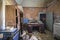 office with chest of drawers in abandoned house