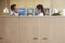 Office Couple Talking Behind Cubicle