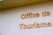 Office de tourisme French tourism office sign on wall building tourist help