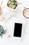 office desk flat lay with coffe, smartphone and succulents, clea