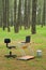 Office desk and laptop in forest