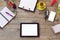 Office desk mock up template with table, smart phone, notebook and cup of coffee. View from above with copy space