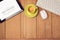 Office desk mock up template with tablet, keyboard and coffee cup. View from above