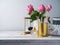 Office desk with pencils, roses and perfume bottle