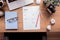 Office desk with resume paperwork and crumpled paper ball