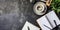 Office desk with stationery, notepad and cup of coffee, top view