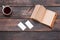 Office desk table with cup, notebook, cards on wooden table