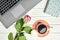 Office desk table with laptop and coffee cup