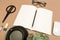 Office desk table with  notebook scissors glasses coffee cup succulent and pencil. Mock up template . Top view