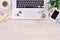 Office desk table workplace with macbook laptop keyboard and iphone smartphone top view flat lay with copy space