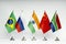 Office flags of the BRICS countries on a light background. Summit of Brazil, Russia, India, China and South Africa.