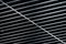 Office grille ceiling. Modern black metal grille ceiling, suspended covering. Abstract design texture