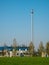 Office / industrial building with a tall chimney.