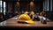 Office meeting with construction team, Yellow safety helmet on the workplace desk